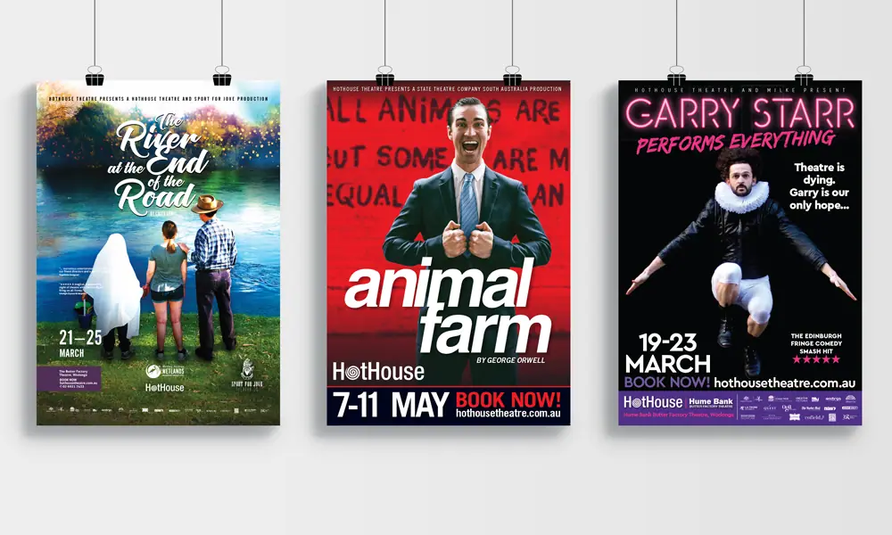 Three Hothouse Theatre production posters hanging side by side for The River at the End of the Road, Animal Farm, and Garry Starr Performs Everything