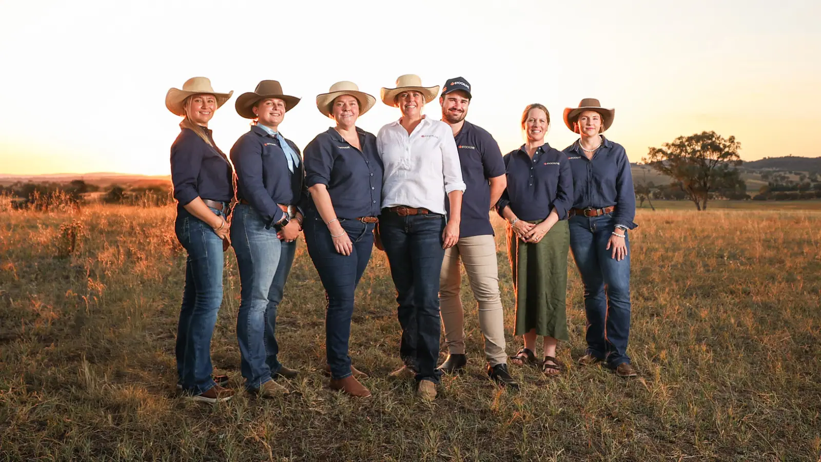 StockLive team standing in a paddock portrait