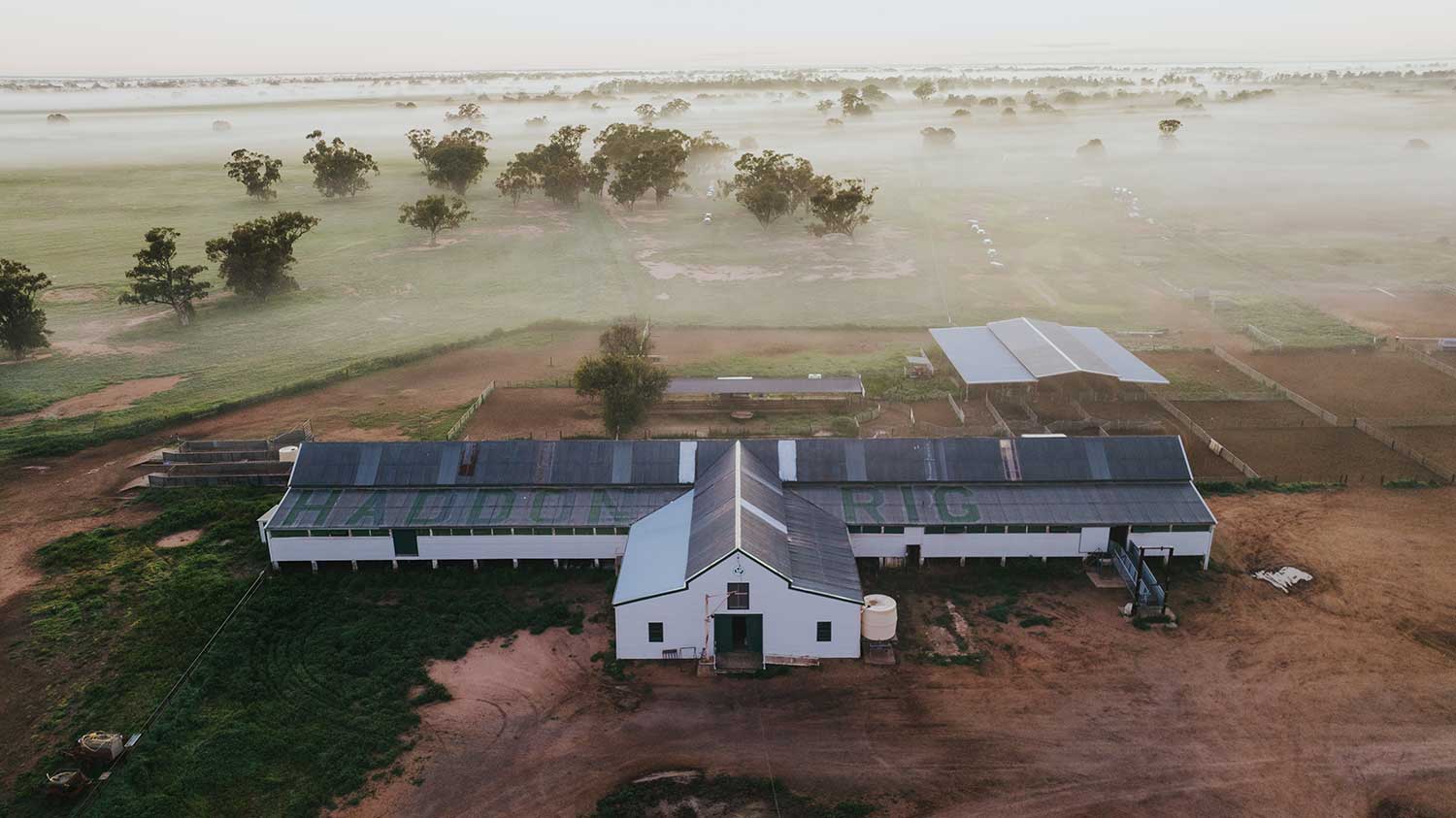 Aerial view of the Haddon Rig woolshed and misty Macquarie River plains